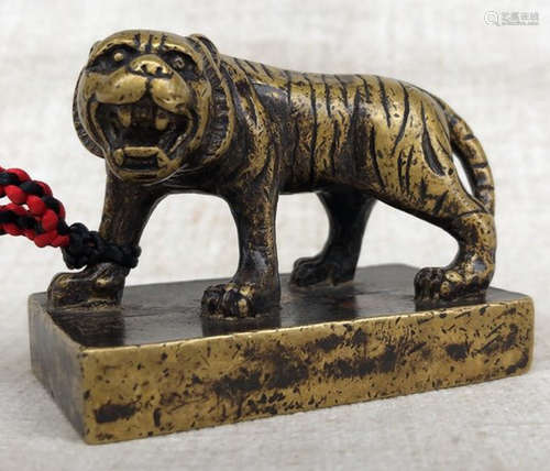 A COPPER CASTED TIGER SHAPE SEAL