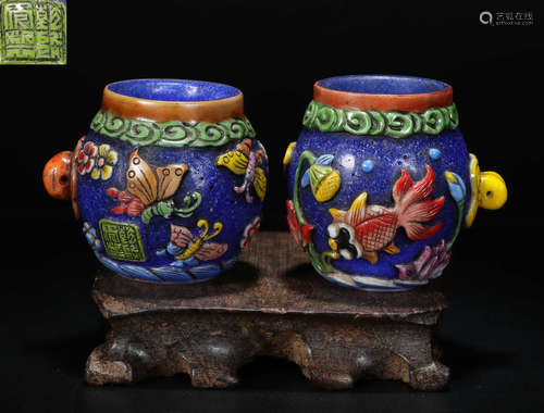 PAIR OF GLASS WITH COLOR LOTUS PATTERN JARS