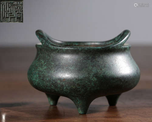 A BRONZE CASTED CENSER WITH DOUBLE EAR