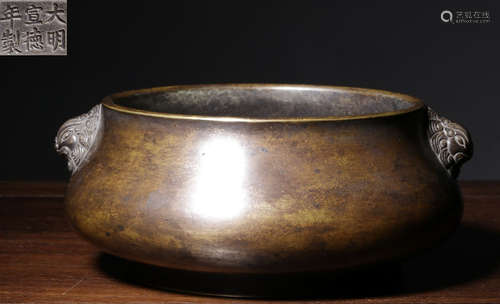 A COPPER CASTED BEAST SHAPE EAR CENSER