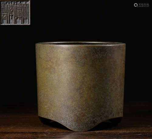 A COPPER CASTED TRIPOD CENSER