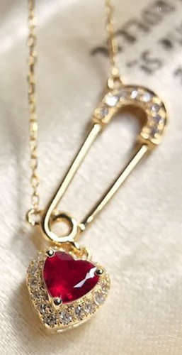 A RUBY CARVED NECKLACE