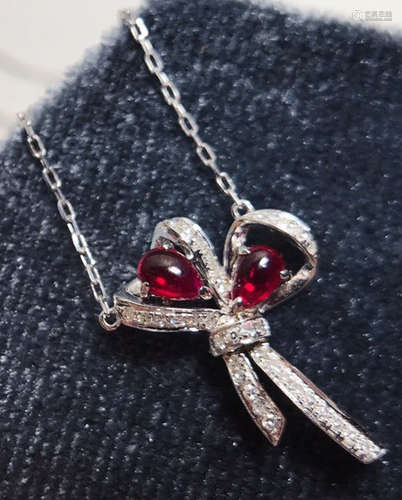 A RUBY CARVED NECKLACE