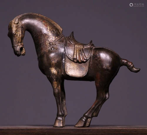 A GILT BRONZE CASTED HORSE SHAPE PENDANT