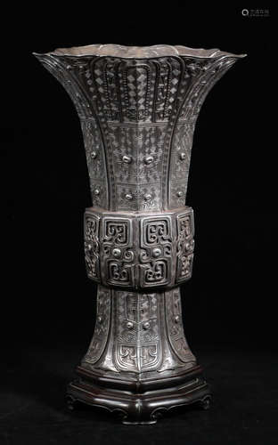 A SILVER CASTED VASE WITH BEAST PATTERN