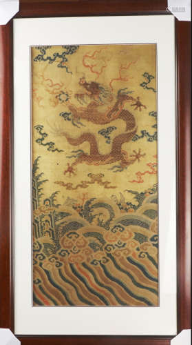 AN EMBROIDERY WITH DRAGON PATTERN
