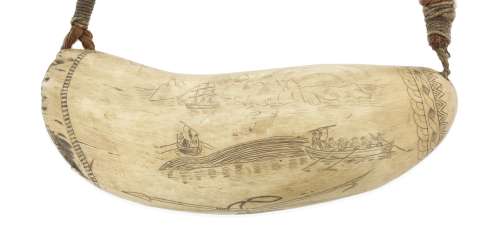 A scrimshawed whale's tooth from the whaler Henrietta, mid 19th century 7 1/2in (19cm) long