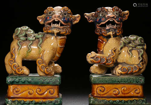 PAIR OF SANCAI GLAZE LION SHAPE PENDANTS