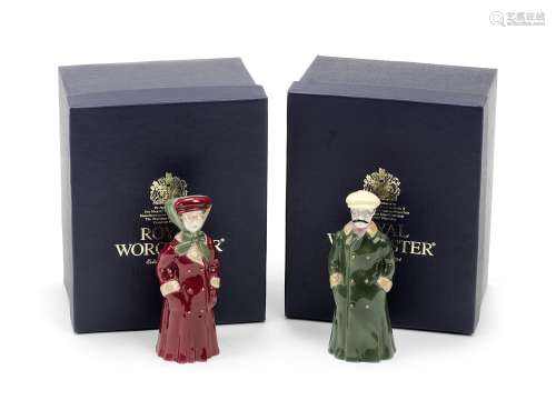 A pair of reproduction glazed ceramic 'The Motorist' candle snuffers by Royal Worcester, ((2))