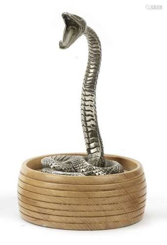 A serpent mascot by A E Lejuene, British, 1920s,