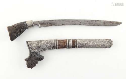 Property of a deceased estate - a 19th century Malay sewar dagger or tumbok lada, with carved horn