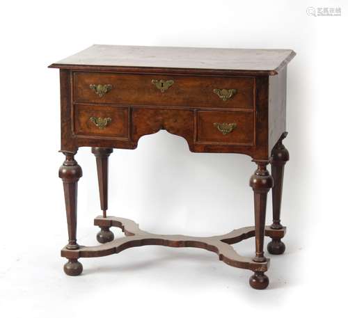 Property of a lady - an early 20th century burr walnut lowboy, losses, 31ins. (78.5cms.) wide.