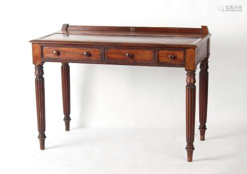 Property of a gentleman - a mahogany side table with three frieze drawers, on turned & fluted