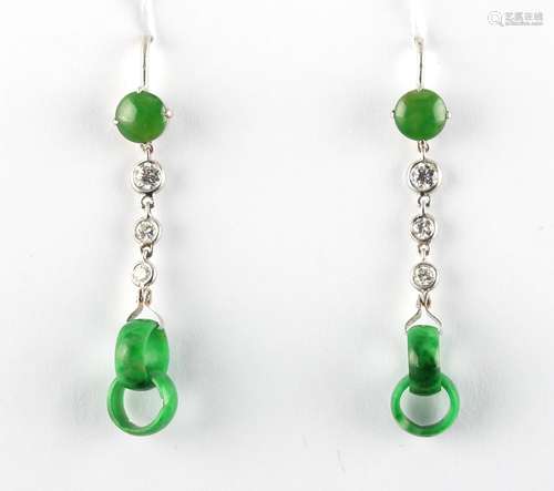 A pair of jadeite & diamond pendant earrings, each with two interlocking jadeite rings suspended