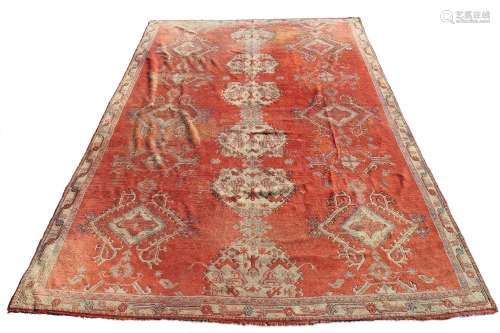 Property of a gentleman - an antique Turkish Ushak carpet, 198 by 128ins. (503 by 325cms.).