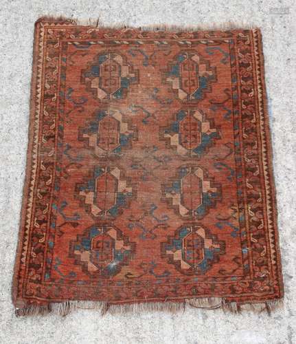 Property of a deceased estate - a small early 20th century Turkoman rug, 41 by 33ins. (104 by