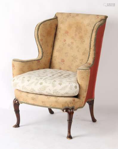 Property of a deceased estate - a George II style upholstered wing armchair (with loose covers in