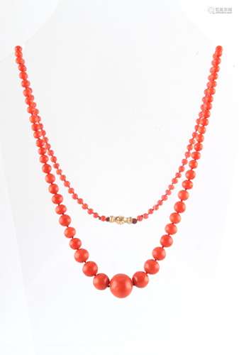 A coral bead necklace, the largest of the 109 graduated beads measuring approximately 14.5mm, the