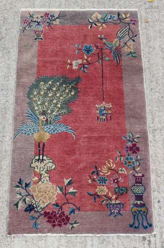 Property of a lady - an early / mid 20th century Chinese hand knotted rug, decorated with birds on a