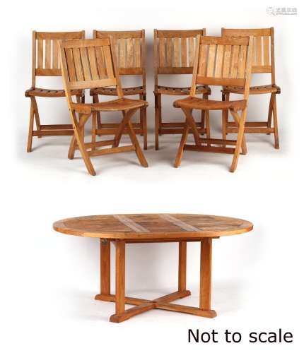 Property of a lady - a Gloster teak extending garden table; together with a matching set of six teak