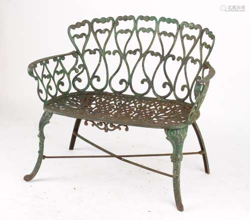 Property of a deceased estate - a green painted cast iron garden seat, 38ins. (97cms.) long.