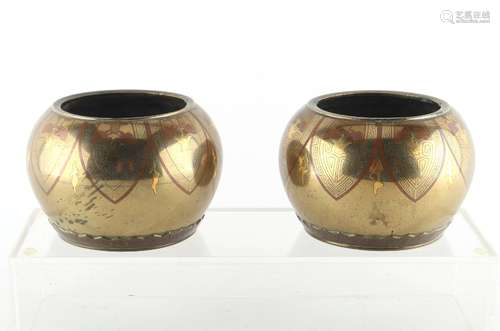 A pair of Japanese bronze & mixed metal circular stands, Meiji period (1868-1912), possibly for