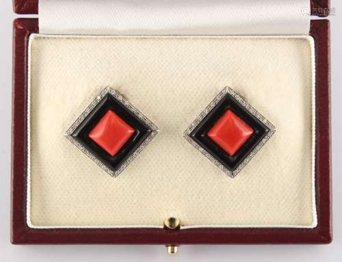 A pair of Art Deco style 18ct white gold diamond coral & black enamel diamond shaped earrings,