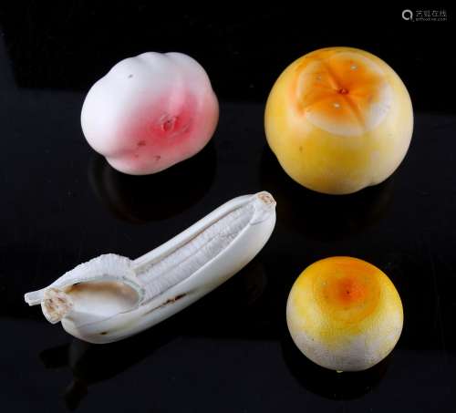 Property of a lady - four Japanese carved ivory models of fruit, late 19th / early 20th century, the