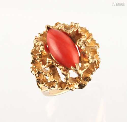 A modern 14ct yellow gold coral ring, approximately 10.7 grams, size M.