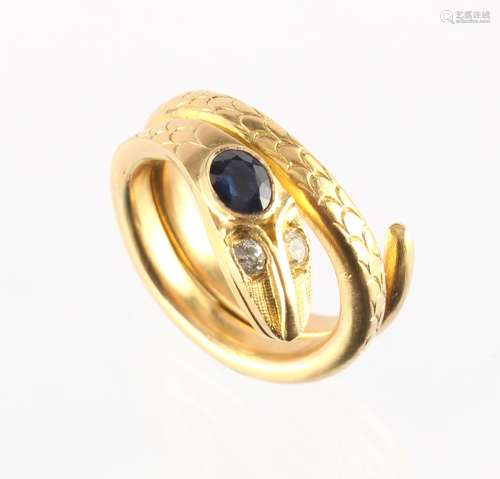An unmarked yellow gold (tests 18ct) snake ring, with round cut diamond inset eyes & oval cushion