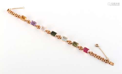 An 18ct yellow gold multi gem set bracelet, the seven various rectangular cut gems including