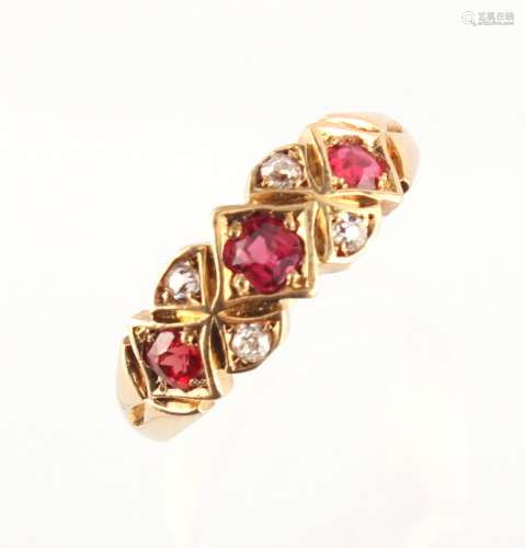 A Victorian 18ct yellow gold ruby & diamond ring, the three oval cushion cut rubies weighing an