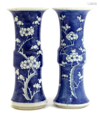 A pair of Chinese blue and white gu vases,