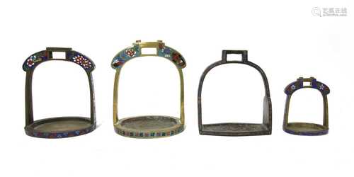 A collection of Chinese cloisonné stirrups,