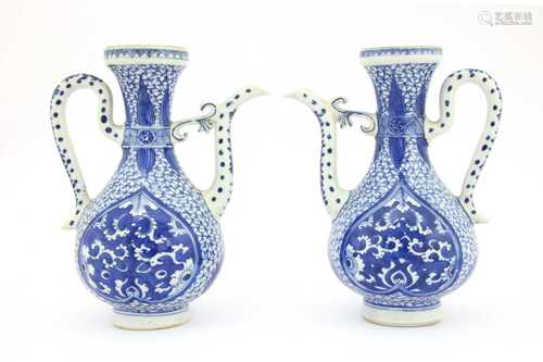 A pair of Chinese blue and white ewers,