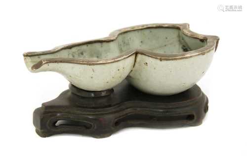 A Chinese stoneware half double gourd,