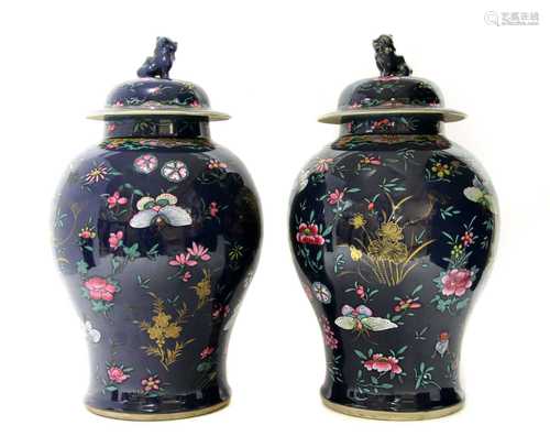 A pair of Chinese famille rose jars and covers,