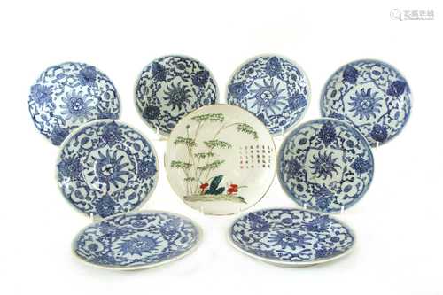 A collection of Chinese blue and white saucers,