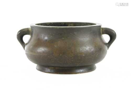 A Chinese bronze incense burner,