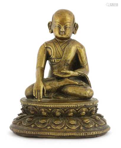 A Tibetan bronze figure,