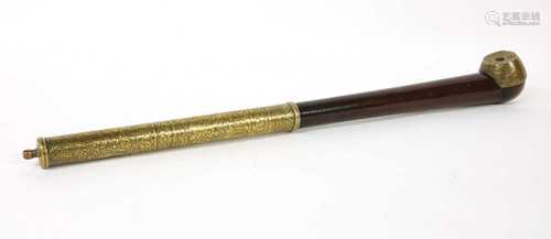 A Chinese wood and brass-mounted opium pipe,