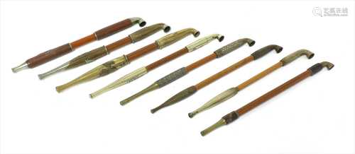 A collection of eight Japanese kiseru tobacco pipes,