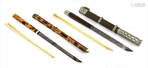 One Japanese tortoiseshell and copper-mounted chopstick cases,