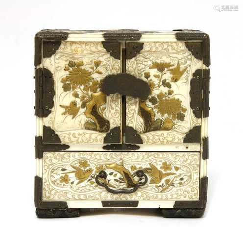 A Japanese ivory and gold lacquered table cabinet,