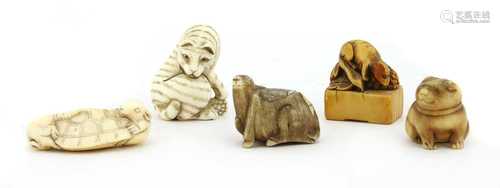 A collection of Japanese ivory netsuke,