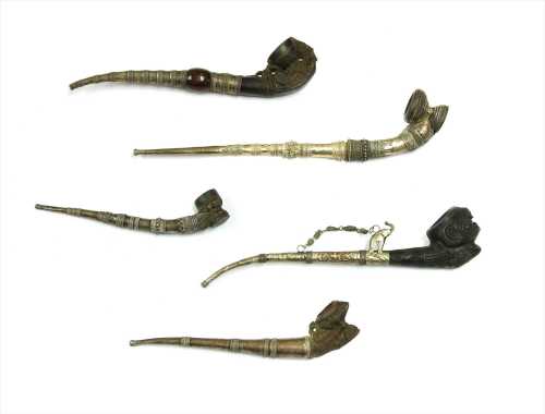 Five Burmese clay-mounted pipes,