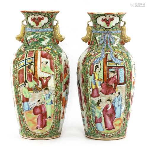 A pair of Chinese Canton enamelled famille rose vases,