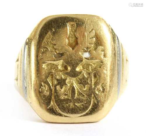 A gold signet ring,