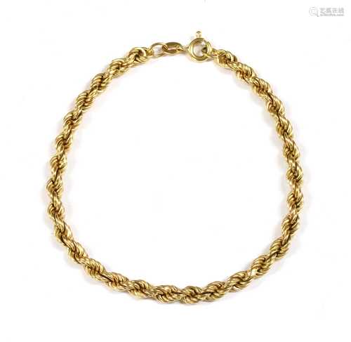 A gold hollow rope link bracelet,