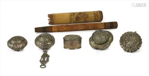 Five Indian silver tobacco pouches,